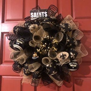 Saints wreath for sale $45, LSU wreath $50